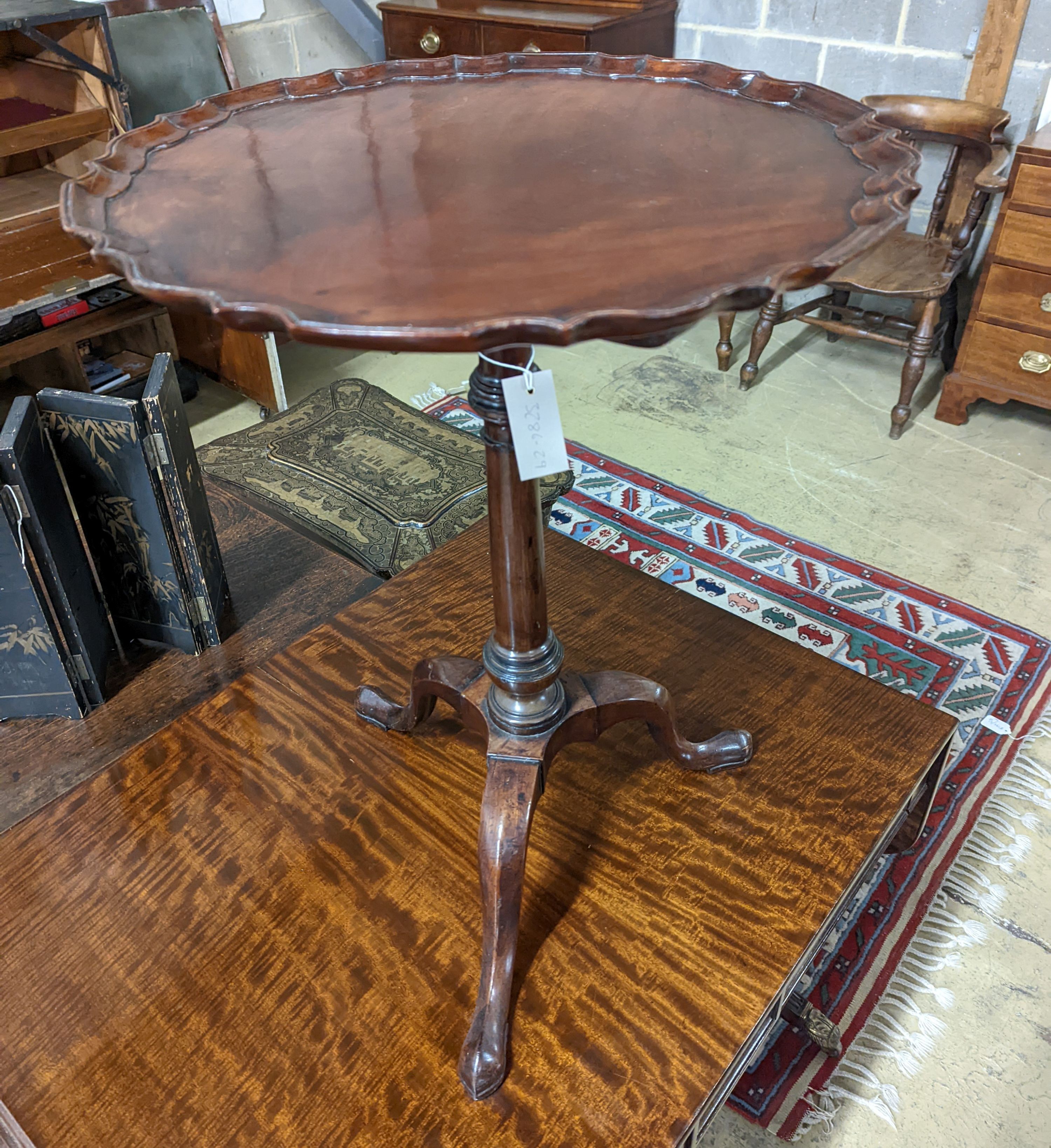 A George III and later mahogany Tripod Wine Table. Diameter - 49cm, Height - 67cm.